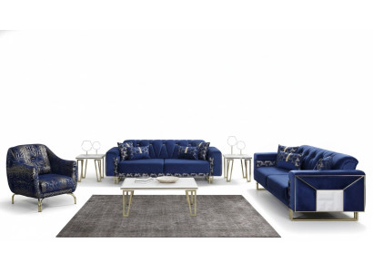 Sofá de lujo azul de diseñador de tres plazas con mesa de centro y mesa auxiliar.