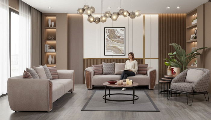 Sala de estar beige juego de sofás tapizados, tres plazas y sillón en textil.