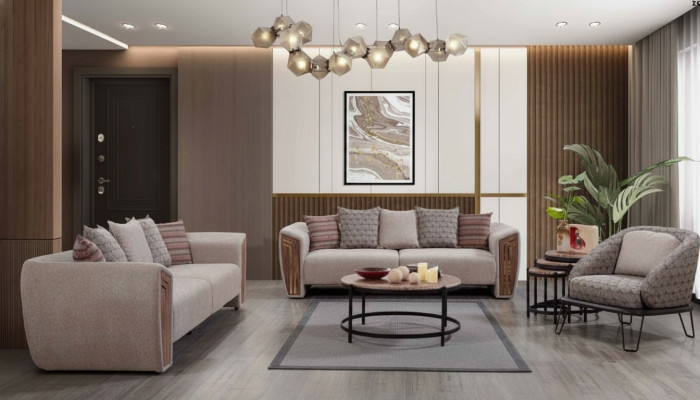 Sala de estar beige juego de sofás tapizados, tres plazas y sillón en textil.
