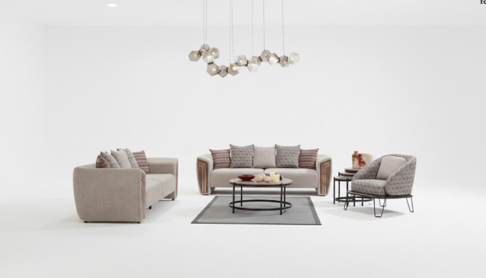 Sala de estar beige juego de sofás tapizados, tres plazas y sillón en textil.