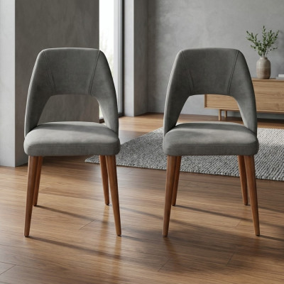 Sillas de comedor exclusivas en color gris-marrón. Sillas de madera de lujo tapizadas.