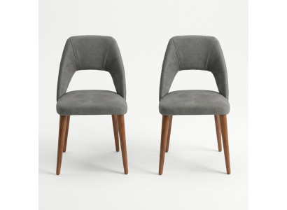 Sillas de comedor exclusivas en color gris-marrón. Sillas de madera de lujo tapizadas.
