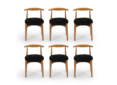 Comedor de lujo de madera con 6 sillas marrones sin apoyabrazos diseño de silla acolchada.