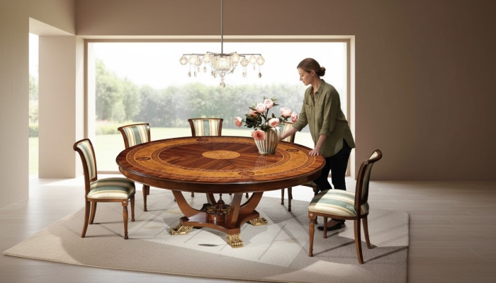 Mesa redonda de madera de estilo clásico para el comedor o la sala de estar en color marrón, nueva.