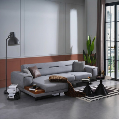 Sofá esquinero gris moderno en forma de L para la sala de estar, lujoso y de diseño nuevo.