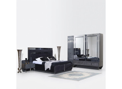 Conjunto de dormitorio negro de lujo con cama, 2 mesitas de noche y armario.