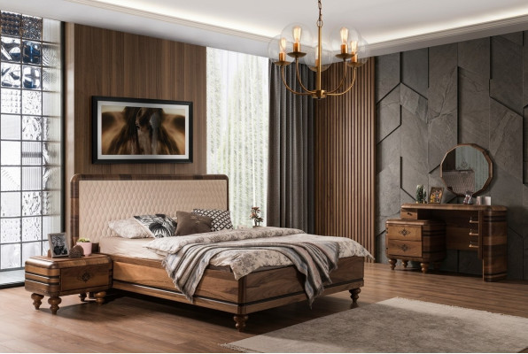 Conjunto de dormitorio clásico de lujo con cama marrón, mesitas de noche y tocador.