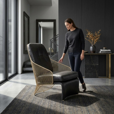 Sillón de diseño para la sala de estar. Asiento individual negro, mueble acolchado estilo lounge.