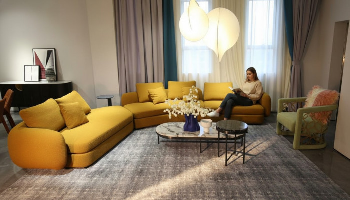 Sala de estar muebles de lujo sofá esquinero en forma de L diseño tapizado textil.