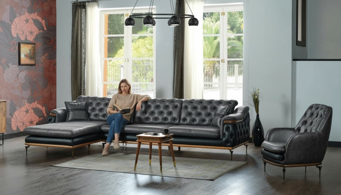 Juego de sala negro con sofá esquinero en forma de L y sillón moderno Chesterfield completo.