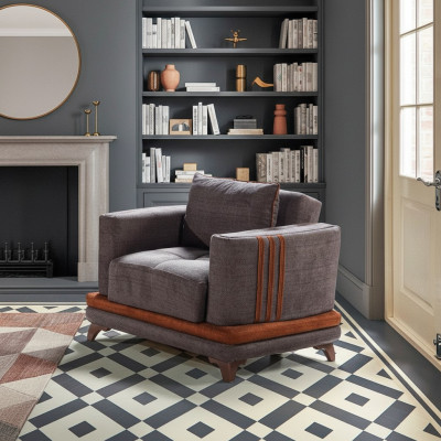 Diseño de sillón de lujo de tela gris para relajarse en el club moderno de lujo.