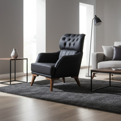 Sillón Chesterfield negro de lujo de una plaza para sala de estar.