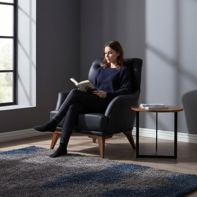 Sillón Chesterfield negro diseñador, ideal para la sala de estar, de un asiento