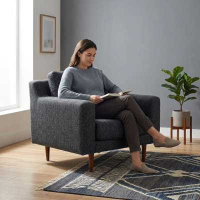 Sillón gris de una plaza de estilo moderno para el salón.