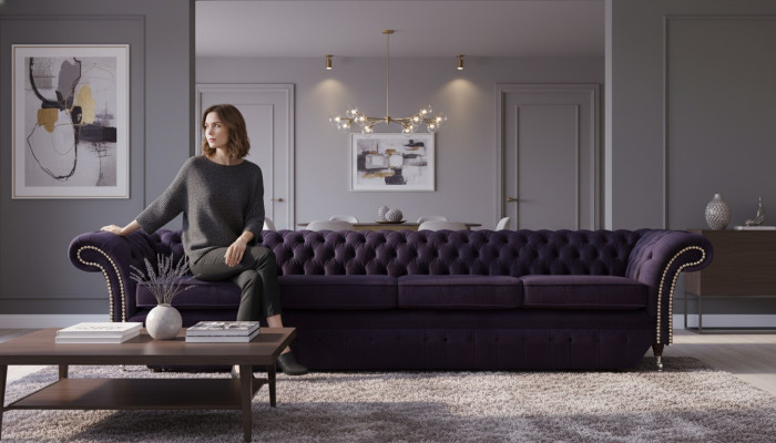 Textil de tapicería Lila Sofá Chesterfield de cuatro plazas para la sala de estar.
