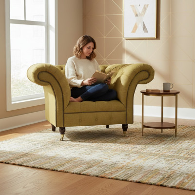 Sillón de tela de lujo Chesterfield nuevo para la sala de estar.