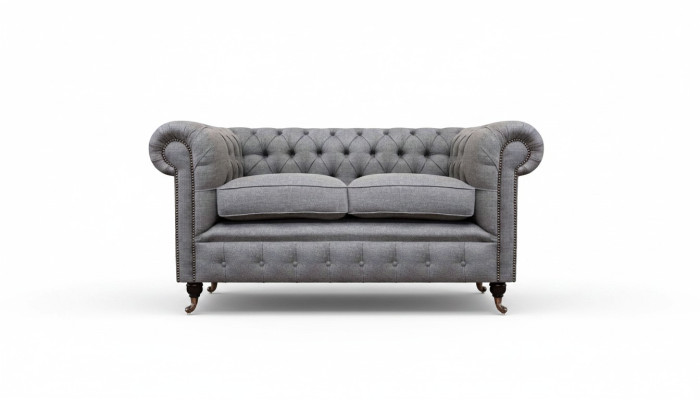 Sofá de diseño tapizado gris de lujo en textil Chesterfield de dos plazas.