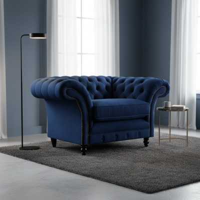 Silla Chesterfield azul de lujo con diseño de tapicería nueva para la decoración de la sala de estar.