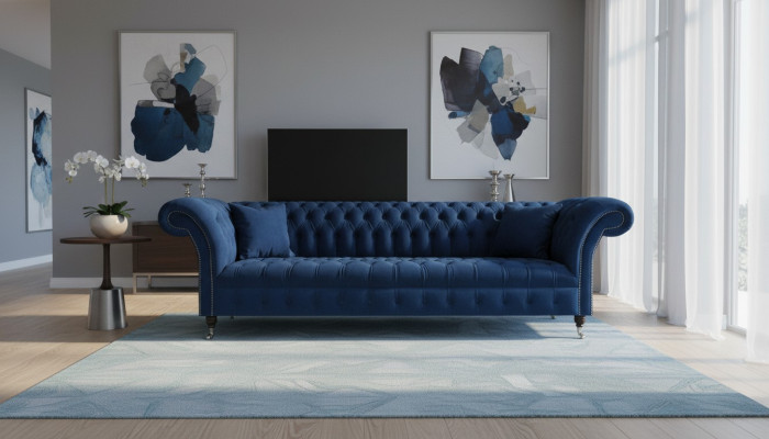 Sofá de tela moderno de diseñador Chesterfield azul.
