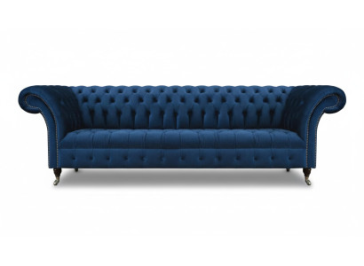 Sofá de tela moderno de diseñador Chesterfield azul.