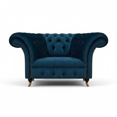 Sillón Chesterfield de una plaza en azul oscuro para la sala de estar, diseño de tapicería.