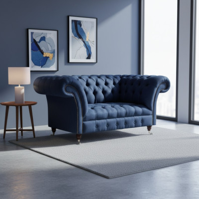 Sofá de tela azul Chesterfield de dos plazas elegante para el salón.