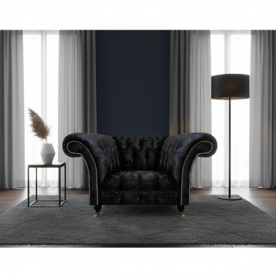 Chesterfield - Sillón de un asiento negro con lujo de respaldo.