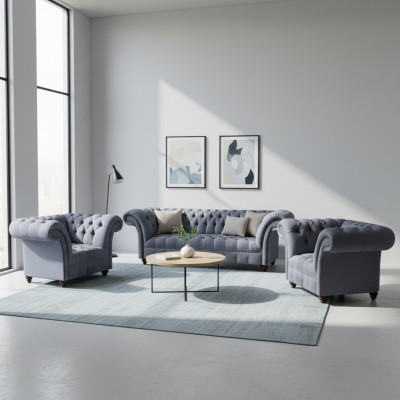 Conjunto de sofás Chesterfield en gris claro con elegante tapizado, un sofá de tres plazas y 2 sillones.
