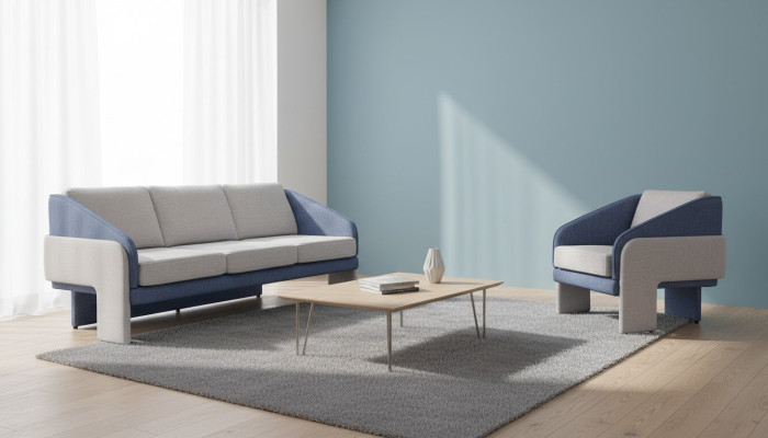 Grises y azules muebles de salón de diseñador, sofá de 3 plazas y sillón reclinable de 2 piezas.