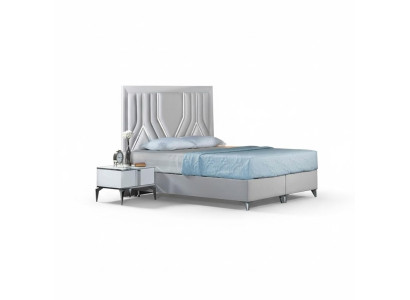 Juego de dormitorio moderno blanco con cama tapizada y mesitas de noche