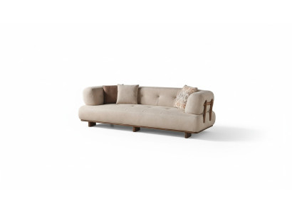 Sofá de tres plazas de diseñador en tono beige para la sala de estar.