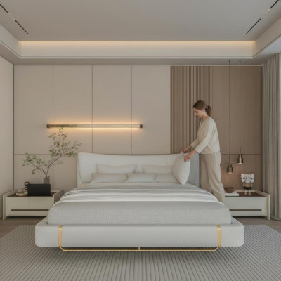 Cama gris lujosa con acentos dorados, diseño moderno y cabecera cómoda