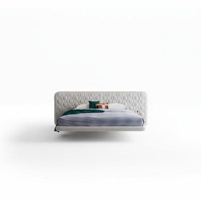Cama tapizada blanca moderna con diseño redondo minimalista
