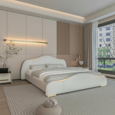 Moderna cama gris con acentos dorados y un elegante cabecero