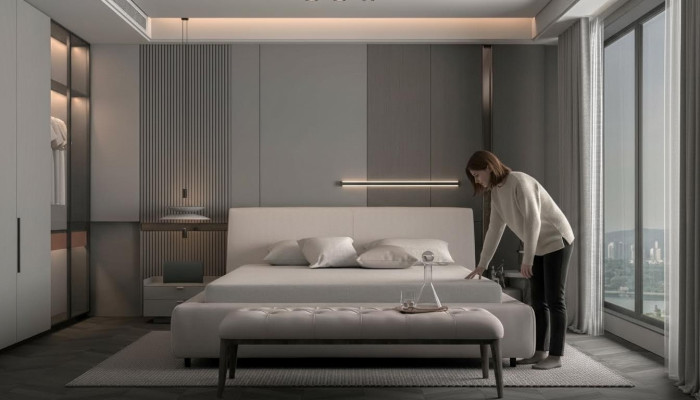 Cama tapizada elegante en beige