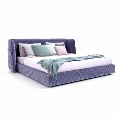 Moderna cama tapizada en lujoso terciopelo azul con un elegante cabecero