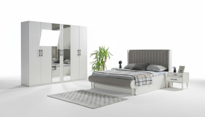 Moderno dormitorio de 4 piezas con cama, armario y mesitas de noche