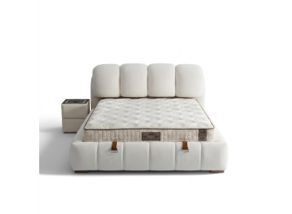 Cama blanca elegante con colchón de diseño moderno