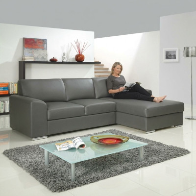 Innovación en la sala de estar: sofá de esquina con tapizado de tela y función de cama desplegable.