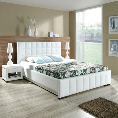 Una lujosa cama de diseño en un estilo contemporáneo sofisticado de la más alta calidad.